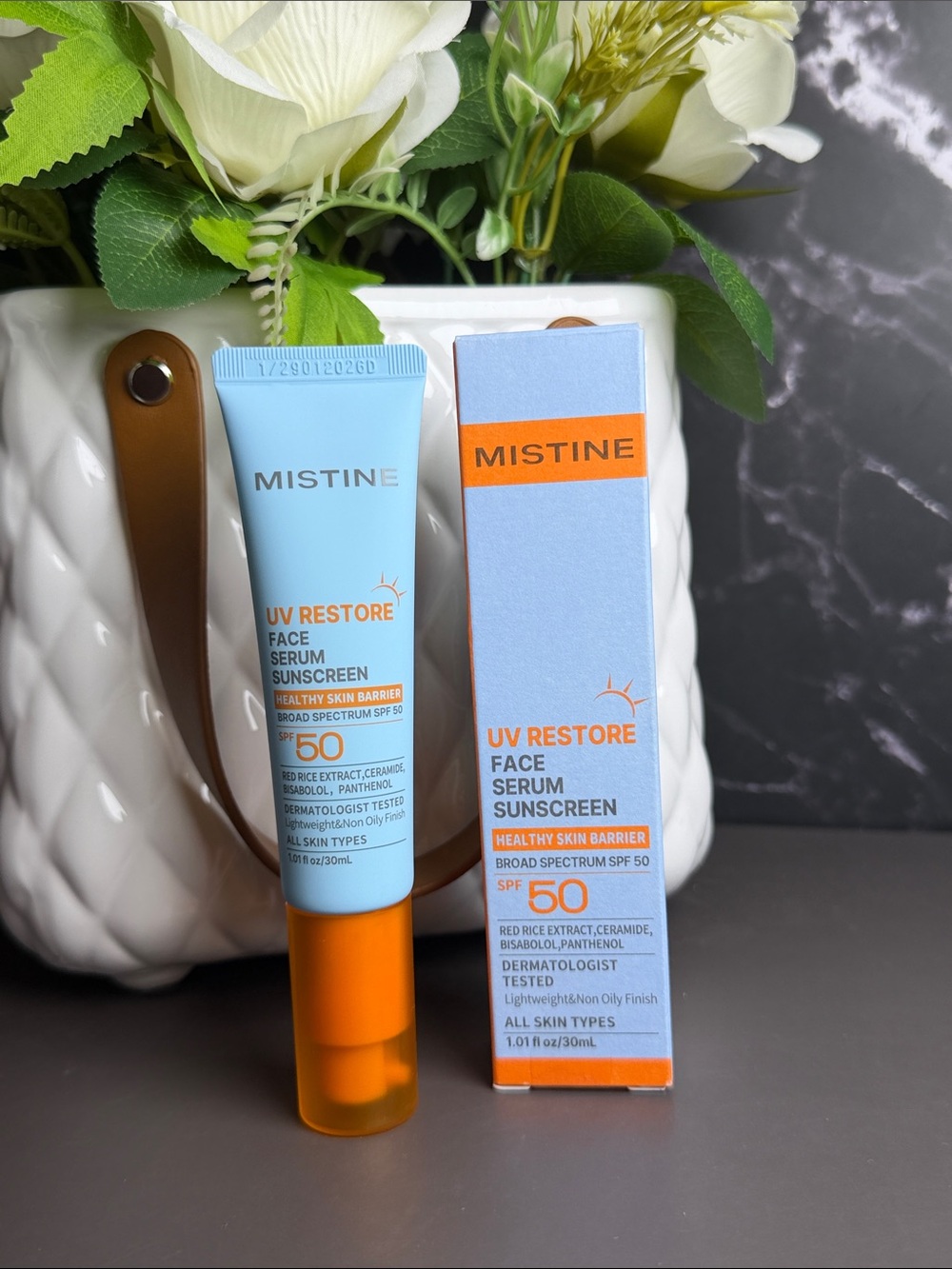 Mistine UV Restore Face Serum Sunscreen SPF 50 — Light Blue & Orange